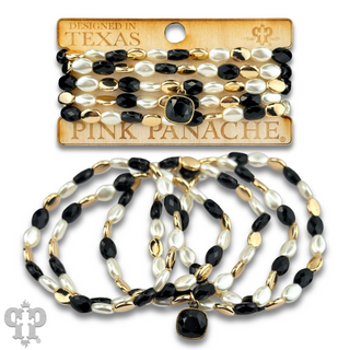 Glass and acrylic oval bead bracelet set with a crystal from Swarovski®