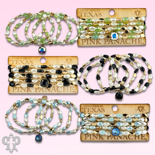 Glass and acrylic oval bead bracelet set with a crystal from Swarovski®
