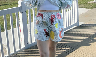 Queen of Sparkles Black & White Seafood on Newspaper Shorts