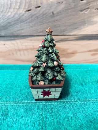 Santa in Boat with Tree Figurine