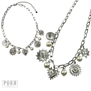 Protection charms and pearl drop necklace