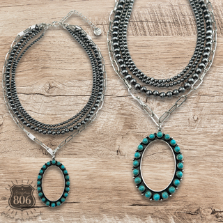 Burnished silver necklace, oval stone pendant