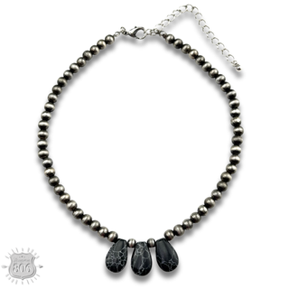 Three stone teardrop necklace