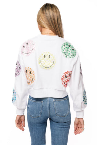 QOS Licensed White Scattered Multi Smiley Sweatshirt - Boutique Bella BellaQueen of Sparkles