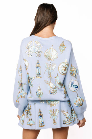 QOS Light Blue Shell Ornament Cardigan - Boutique Bella BellaQueen of Sparkles